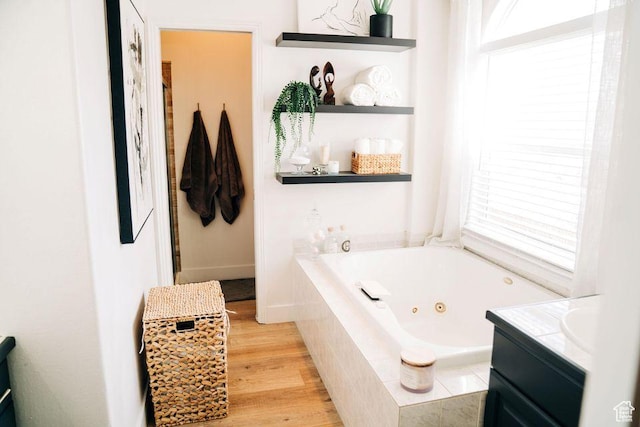 290 W 300 N, Beaver, UT 84713 - full bath with vanity, a whirlpool tub, and wood finished floors