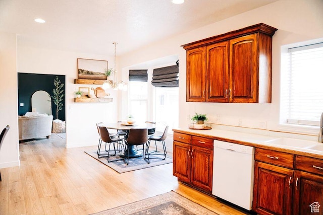 290 W 300 N, Beaver, UT 84713 - kitchen featuring white dishwasher, light countertops, light wood-style floors, a sink, and recessed lighting