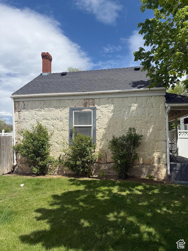 290 W 300 N, Beaver, UT 84713 - view of property exterior featuring a chimney, roof with shingles, and stucco siding