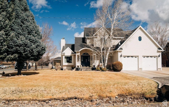 290 W 300 N, Beaver, UT 84713 - view of front of property featuring concrete driveway, a front yard, covered porch, and a chimney
