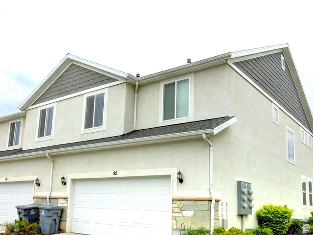 92 E 1040 N, Santaquin, UT 84655 - view of home's exterior with stucco siding and a garage