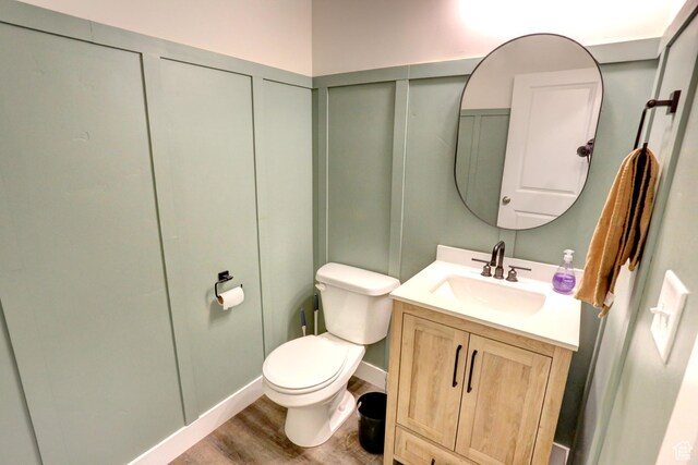 92 E 1040 N, Santaquin, UT 84655 - half bathroom featuring toilet, vanity, and wood finished floors