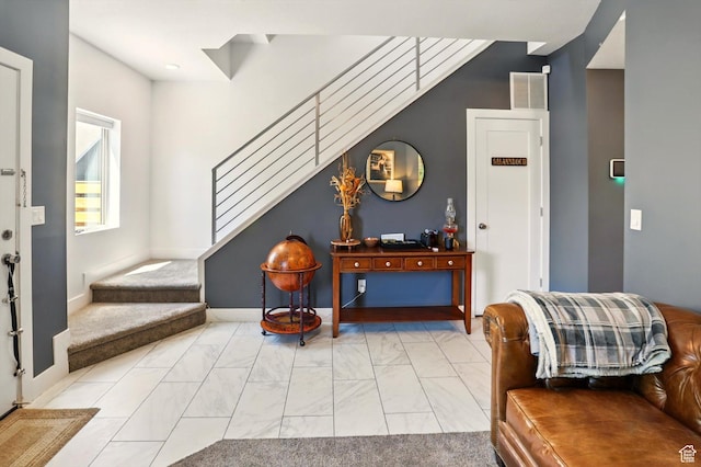 2237 N 450 W, Layton, UT 84041 - entrance foyer with marble finish floor, stairs, baseboards, and visible vents