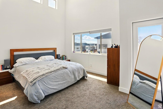 2237 N 450 W, Layton, UT 84041 - carpeted bedroom featuring multiple windows, baseboards, and a high ceiling