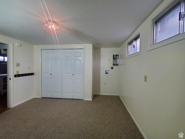 350 N 3rd St, Montpelier, ID 83254 - unfurnished bedroom with carpet flooring, baseboards, a closet, and a chandelier