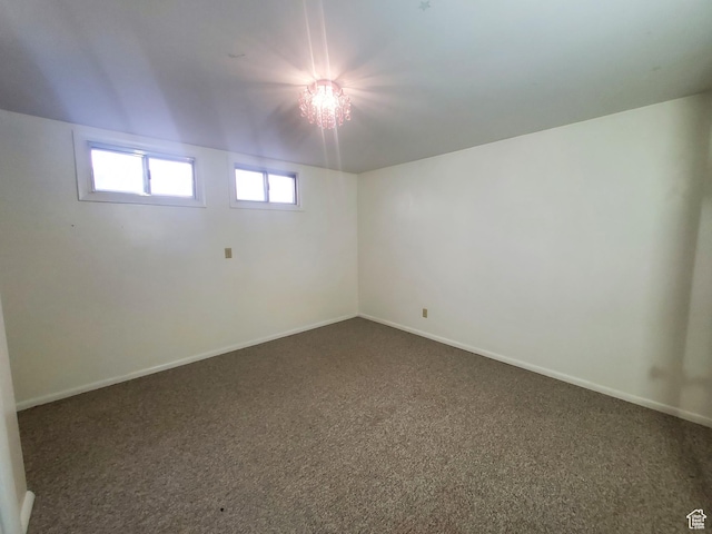 350 N 3rd St, Montpelier, ID 83254 - empty room with dark carpet and baseboards