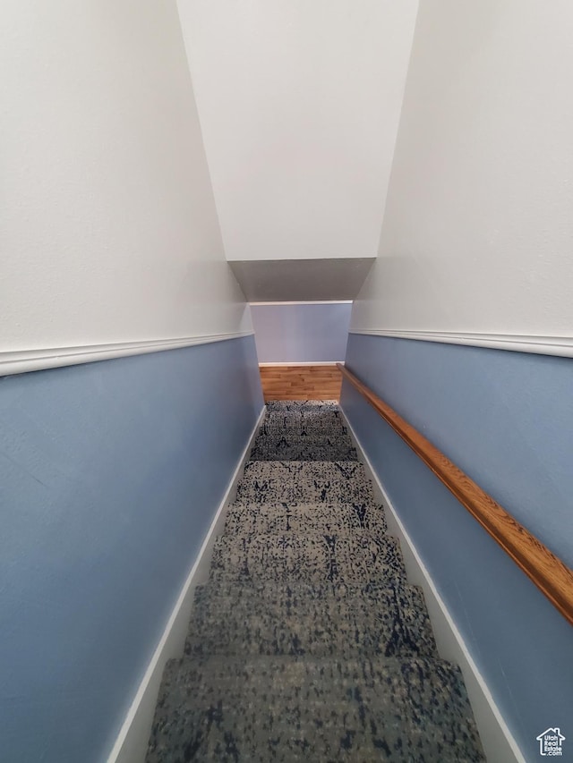 350 N 3rd St, Montpelier, ID 83254 - stairway featuring baseboards and wood finished floors