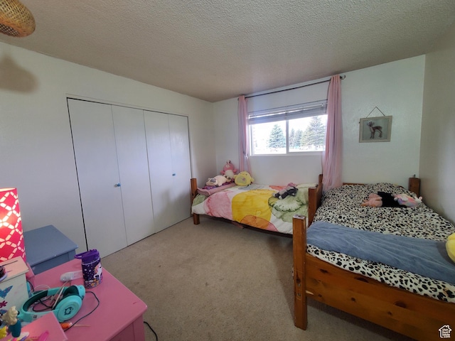 350 N 3rd St, Montpelier, ID 83254 - carpeted bedroom featuring a closet and a textured ceiling