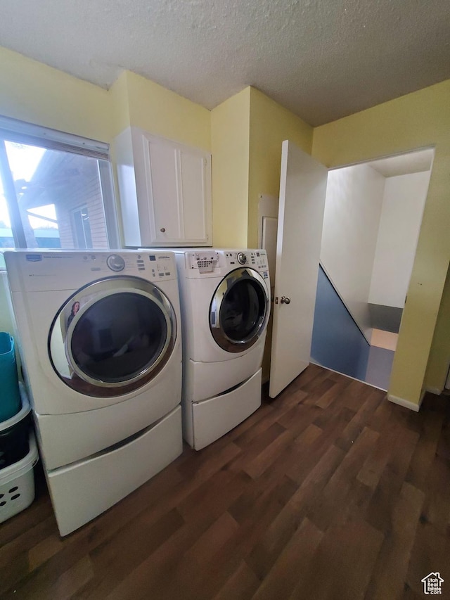 350 N 3rd St, Montpelier, ID 83254 - clothes washing area featuring washer and dryer, dark wood-type flooring, and a textured ceiling