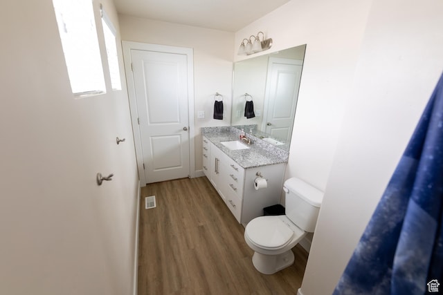 987 W 600 S, Brigham City, UT 84302 - bathroom featuring toilet, wood finished floors, and vanity