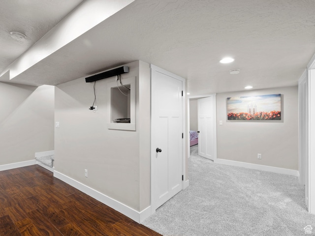 1827 W Burke Ln, Farmington, UT 84025 - finished basement with recessed lighting, a textured ceiling, baseboards, and wood finished floors