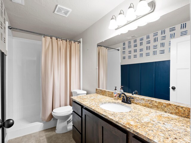 1827 W Burke Ln, Farmington, UT 84025 - bathroom featuring toilet, vanity, curtained shower, visible vents, and tile patterned flooring