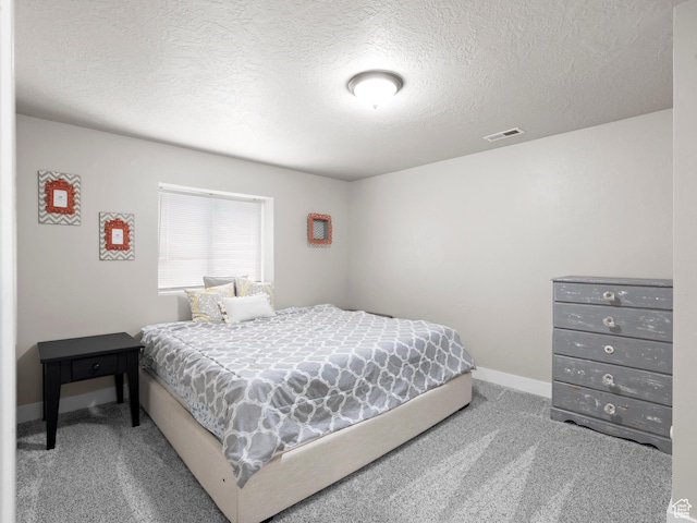 1827 W Burke Ln, Farmington, UT 84025 - carpeted bedroom with baseboards, visible vents, and a textured ceiling