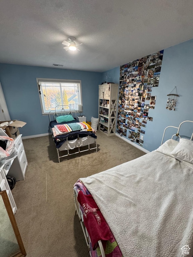 2247 Country Oaks Dr, Layton, UT 84040 - carpeted bedroom with a textured ceiling, visible vents, and baseboards