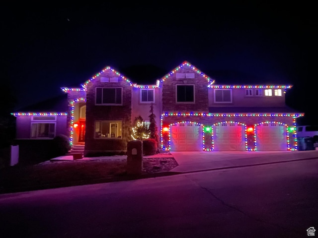 2247 Country Oaks Dr, Layton, UT 84040 - view of front of house with driveway and a garage