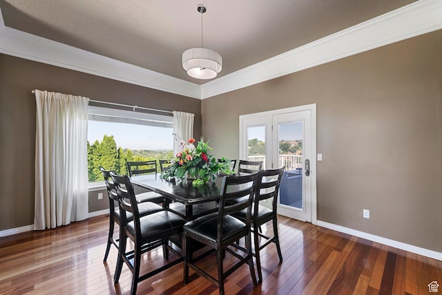 2247 Country Oaks Dr, Layton, UT 84040 - dining room featuring plenty of natural light, hardwood / wood-style floors, and ornamental molding