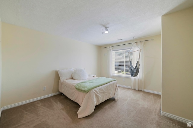 2247 Country Oaks Dr, Layton, UT 84040 - bedroom featuring light carpet and a textured ceiling