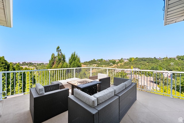 2247 Country Oaks Dr, Layton, UT 84040 - patio / terrace with an outdoor living space with a fire pit