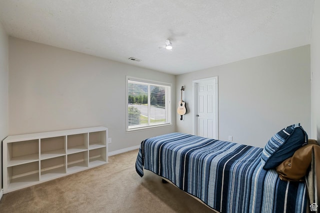 2247 Country Oaks Dr, Layton, UT 84040 - carpeted bedroom with a textured ceiling and baseboards
