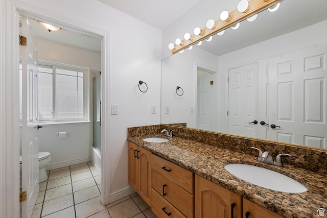 2247 Country Oaks Dr, Layton, UT 84040 - bathroom with double vanity, tile patterned flooring, and bath / shower combo with glass door
