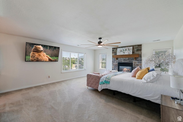 2247 Country Oaks Dr, Layton, UT 84040 - bedroom featuring carpet flooring, a fireplace, and a ceiling fan