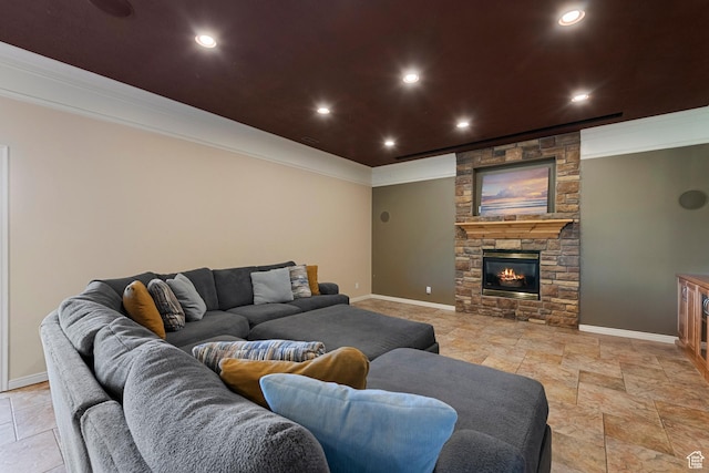 2247 Country Oaks Dr, Layton, UT 84040 - living area with ornamental molding, stone tile flooring, recessed lighting, and a fireplace