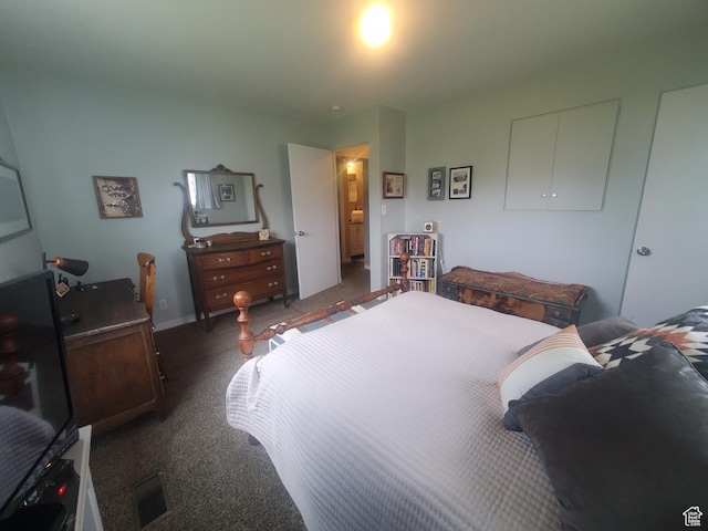 bedroom featuring visible vents and carpet
