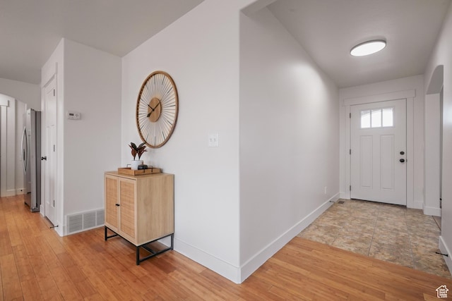 235 E Caracara St S, Saratoga Springs, UT 84043 - interior space featuring baseboards, light wood finished floors, and visible vents