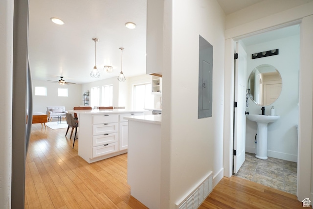 235 E Caracara St S, Saratoga Springs, UT 84043 - corridor with light wood-type flooring, visible vents, and recessed lighting