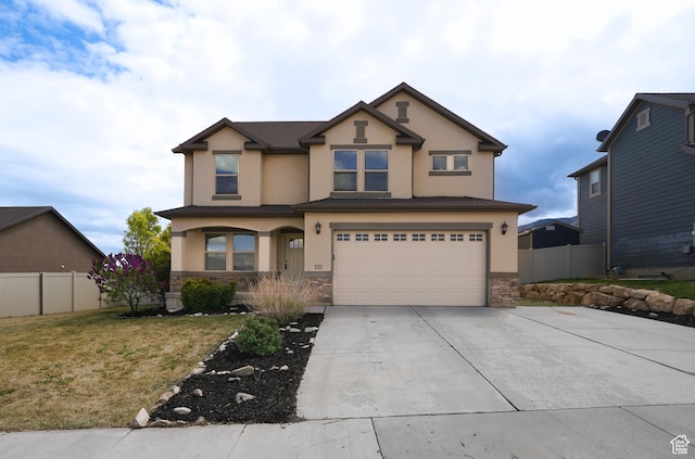 235 E Caracara St S, Saratoga Springs, UT 84043 - craftsman house with fence, stucco siding, and stone siding