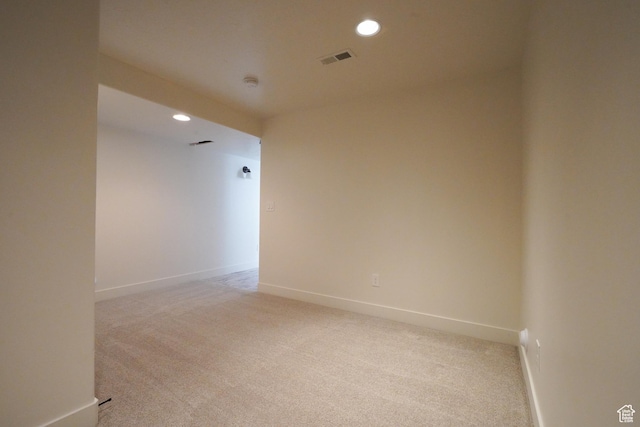 235 E Caracara St S, Saratoga Springs, UT 84043 - empty room featuring light carpet, baseboards, and recessed lighting