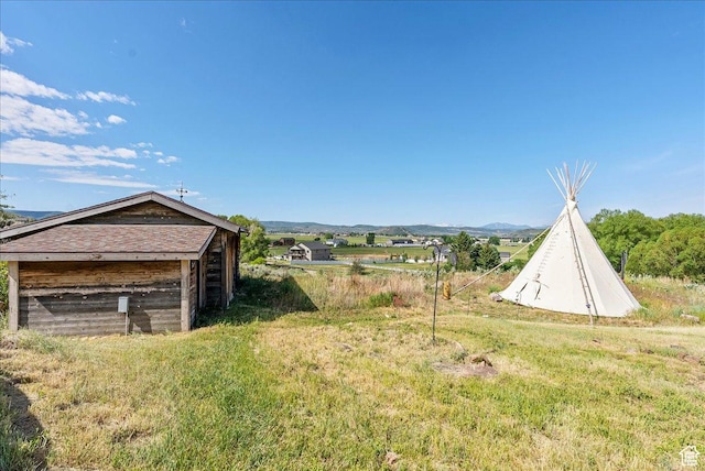 1071 S Foothill Dr E Unit 1, Kamas, UT 84036 - view of yard with a mountain view