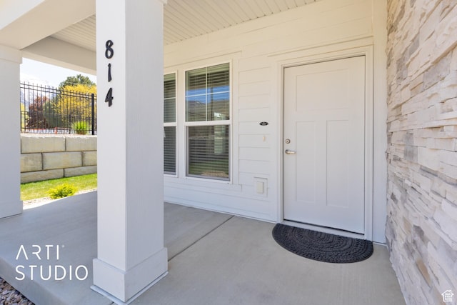 814 E 110 S, Salem, UT 84653 - doorway to property featuring covered porch and fence