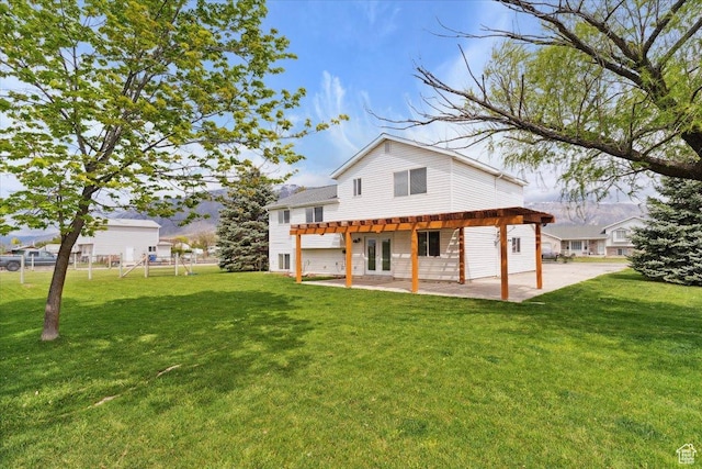 3035 N 2575 W, Farr West, UT 84404 - back of property with a yard, a patio, and french doors