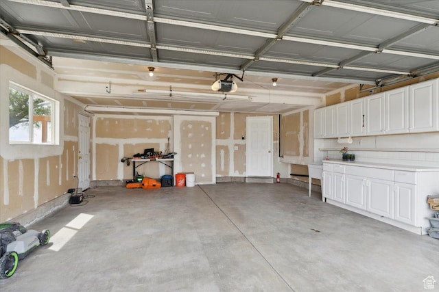 3035 N 2575 W, Farr West, UT 84404 - garage featuring a garage door opener
