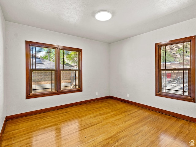 1362 Marilyn Dr, Ogden, UT 84403 - spare room with light wood-type flooring and baseboards