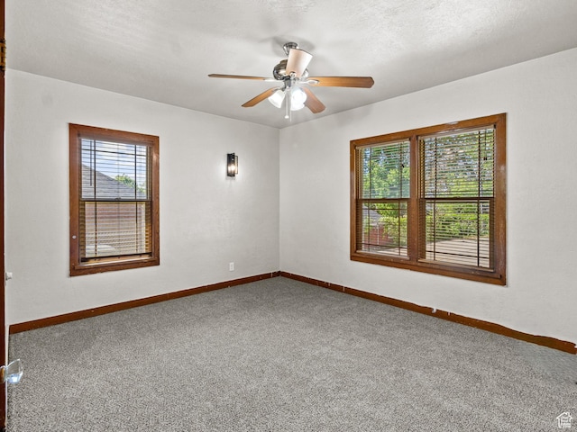 1362 Marilyn Dr, Ogden, UT 84403 - spare room with carpet floors, baseboards, and a ceiling fan