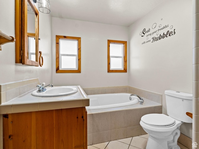 1362 Marilyn Dr, Ogden, UT 84403 - bathroom featuring tile patterned floors, toilet, a garden tub, and vanity