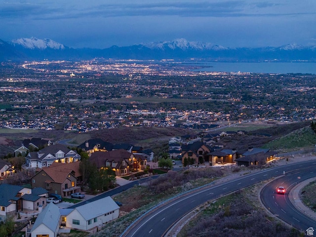 aerial view of residential area with a mountainous background