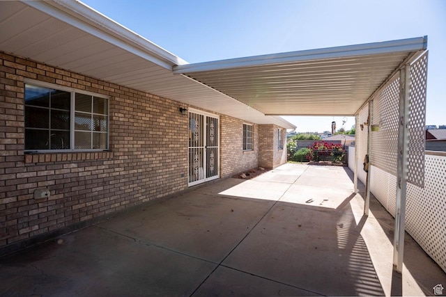 1090 E 700 S Unit 16, St George, UT 84790 - view of patio / terrace featuring an attached carport