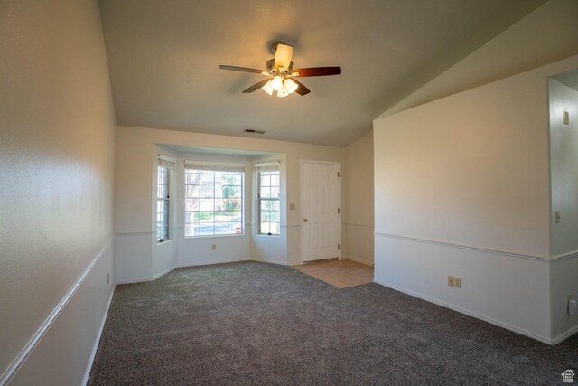 1090 E 700 S Unit 16, St George, UT 84790 - empty room featuring carpet, visible vents, vaulted ceiling, ceiling fan, and baseboards