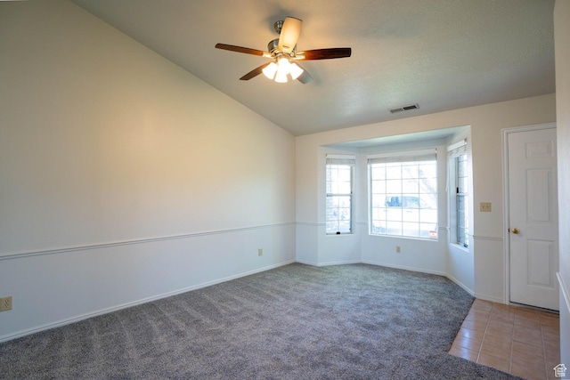 1090 E 700 S Unit 16, St George, UT 84790 - carpeted empty room with vaulted ceiling, baseboards, a ceiling fan, and visible vents