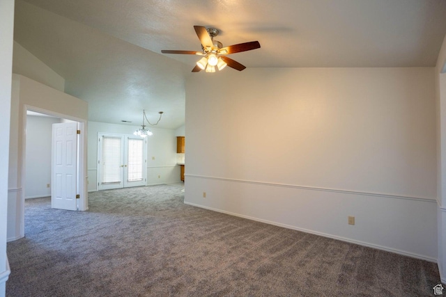 1090 E 700 S Unit 16, St George, UT 84790 - carpeted empty room featuring baseboards, ceiling fan with notable chandelier, and vaulted ceiling