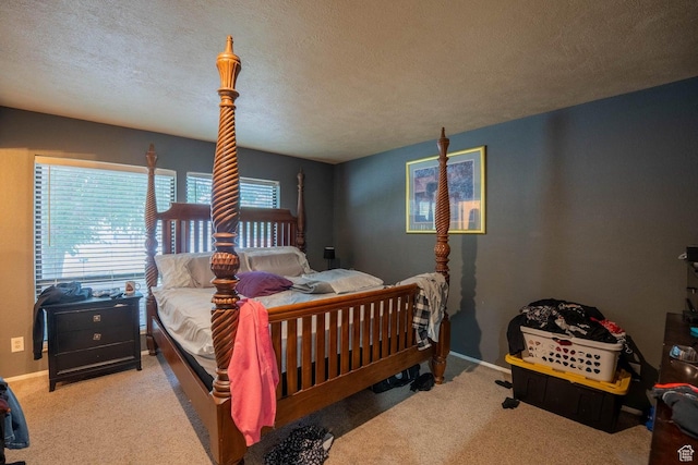 944 Gardenia Cir, St George, UT 84790 - bedroom with baseboards, a textured ceiling, and carpet floors