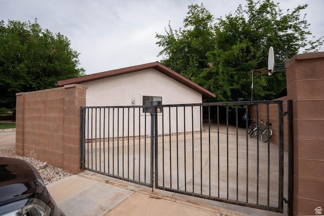 944 Gardenia Cir, St George, UT 84790 - view of gate featuring fence