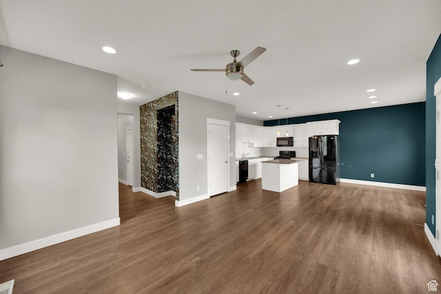 94 S Walker Ln, North Salt Lake, UT 84054 - unfurnished living room featuring a ceiling fan, baseboards, recessed lighting, and dark wood finished floors