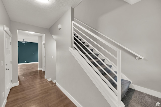 94 S Walker Ln, North Salt Lake, UT 84054 - staircase featuring baseboards, a ceiling fan, wood finished floors, and a textured ceiling
