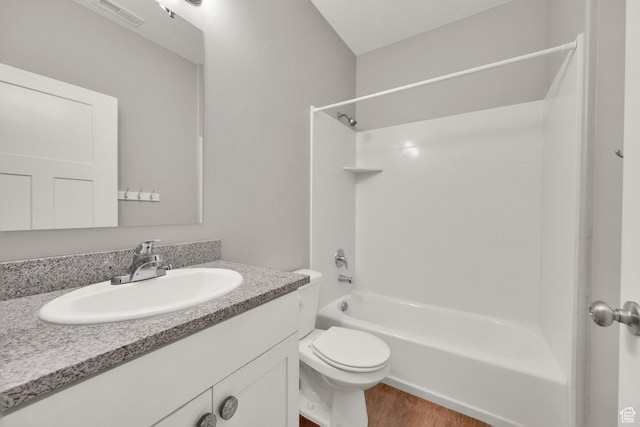 94 S Walker Ln, North Salt Lake, UT 84054 - bathroom with  shower combination, vanity, toilet, and wood finished floors