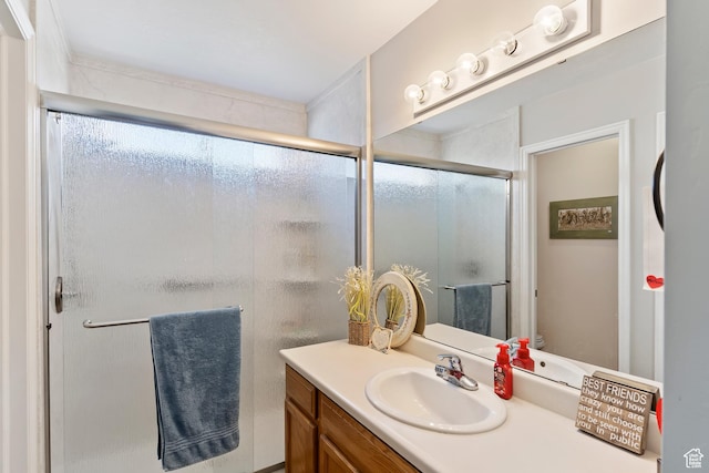 full bath featuring a shower stall and vanity