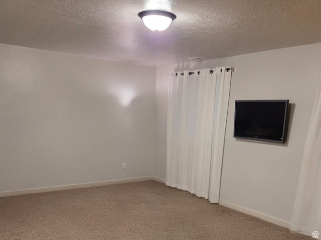 125 E Christley Ln, Elk Ridge, UT 84651 - unfurnished room featuring carpet floors, a textured ceiling, and baseboards